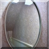 D03. Oval silver mirror with beaded edge 32”h x 22”w 